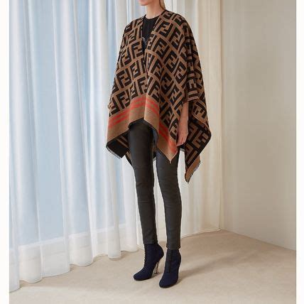 fendi poncho cape|fendi poncho long fur cape.